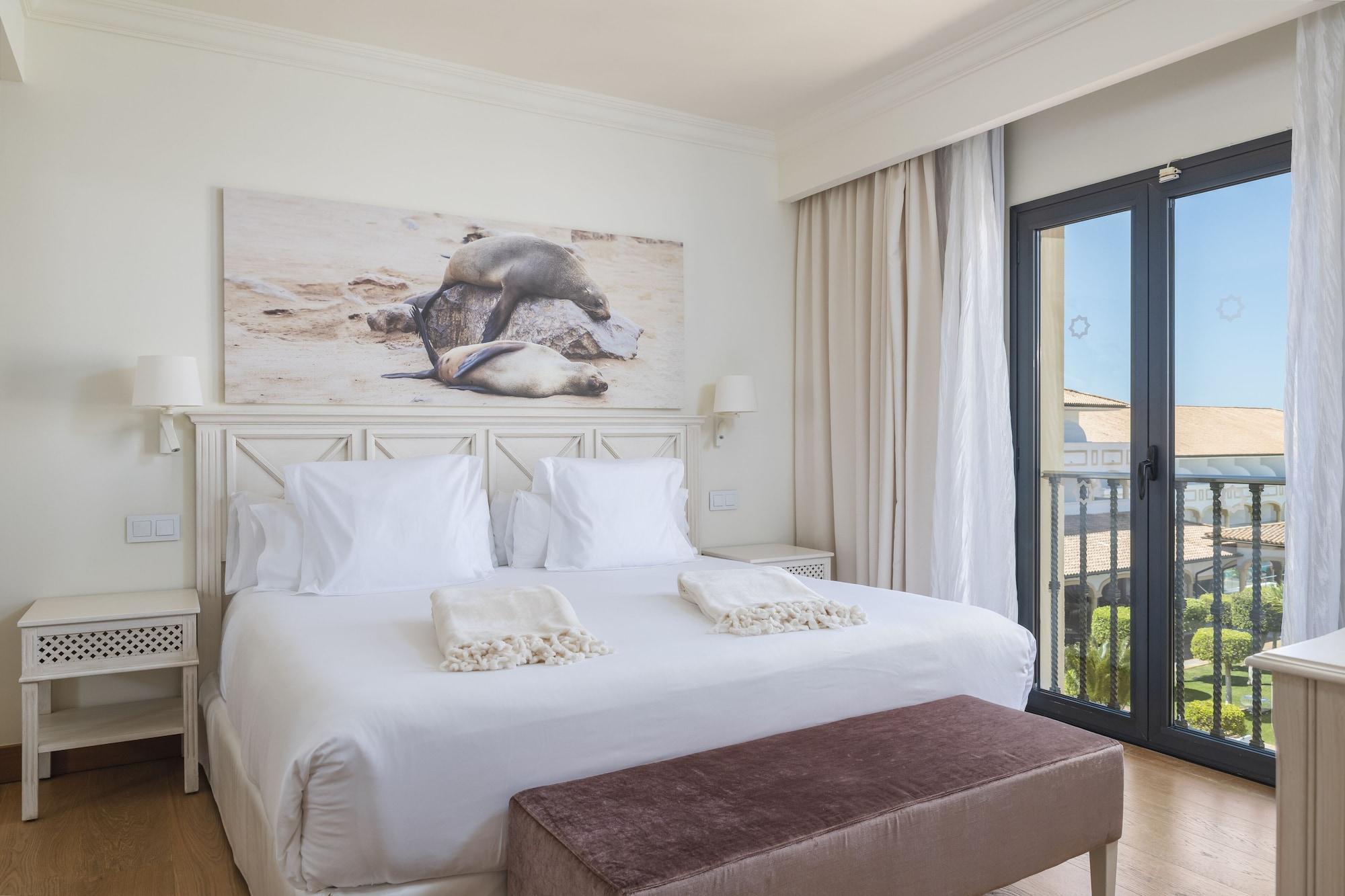 فندق إيبيروستار سيليكشن أندالوسيا بلايا شيكلانا دي لا فرونتيرا المظهر الخارجي الصورة A bedroom at the hotel